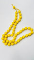 Collana con sfere gialle in resina lucida