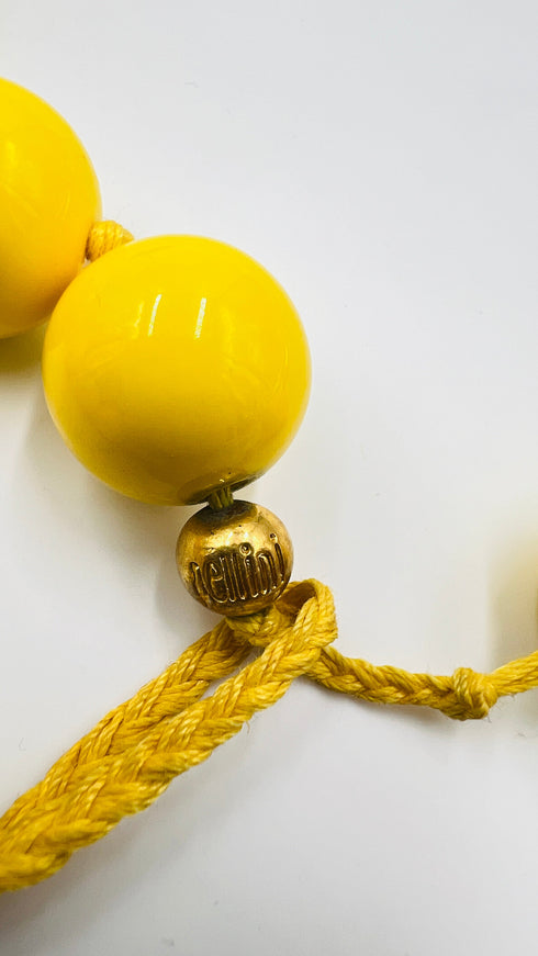 Collana con sfere gialle in resina lucida