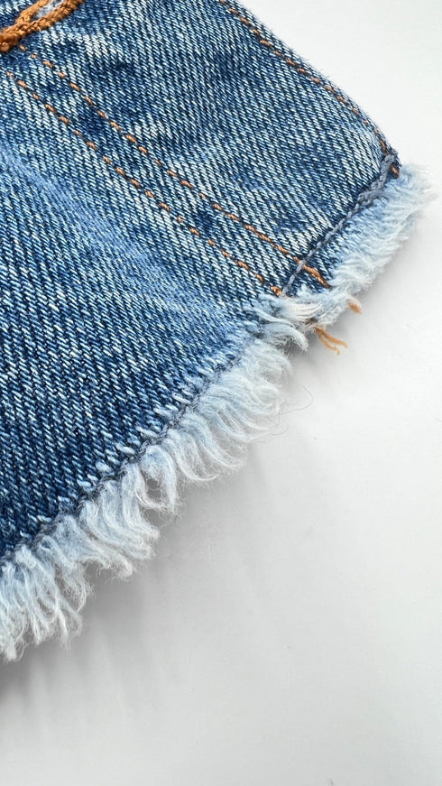 Giacca cropped sfrangiata