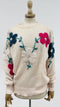 Maglione a fiori in lana