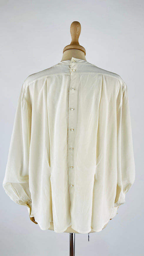 Blusa girocollo in seta con fiocco