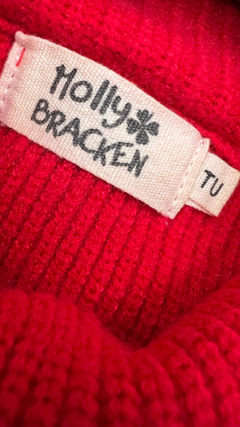 Poncho collo alto e frange