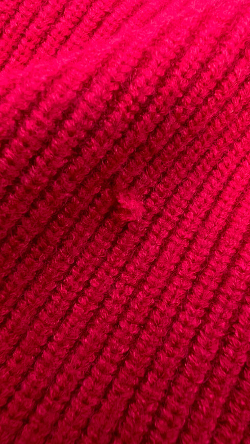 Poncho collo alto e frange