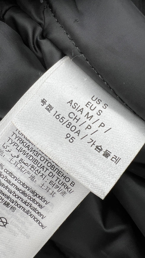 Giacca in jeans con cartellino