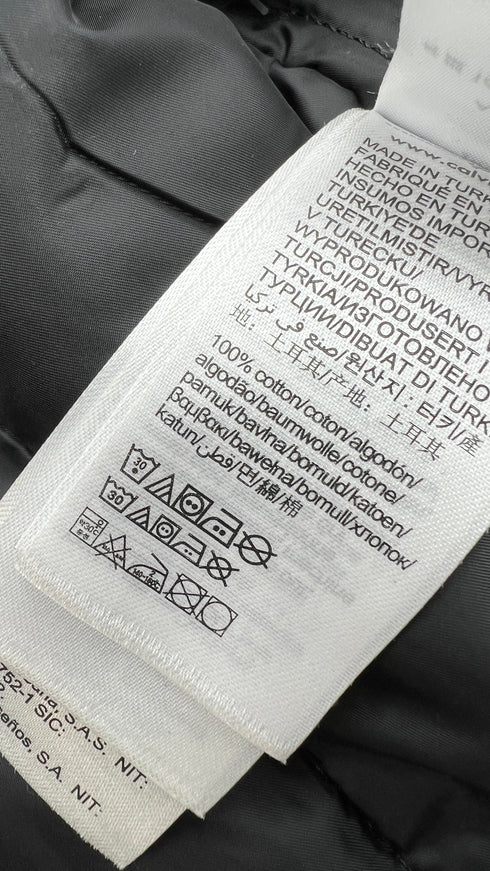 Giacca in jeans con cartellino