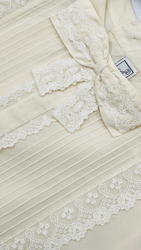 Blusa girocollo in seta con fiocco