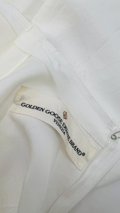 Top scollo V con cartellino