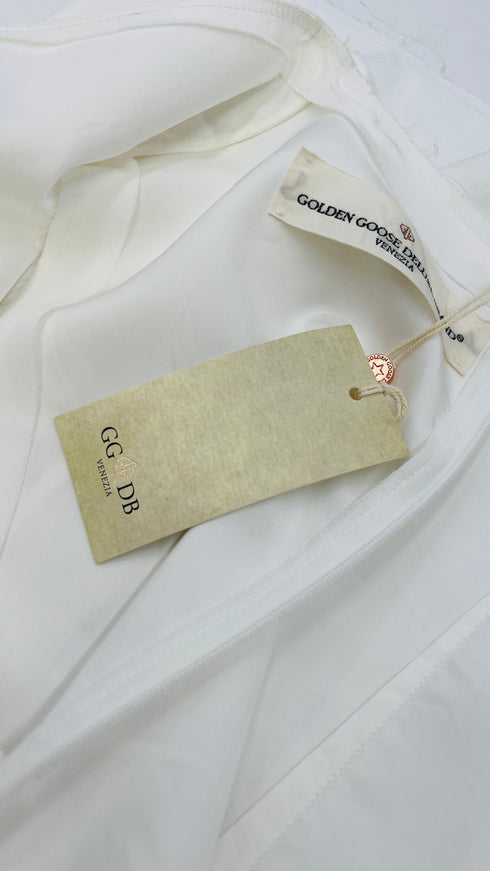 Top scollo V con cartellino