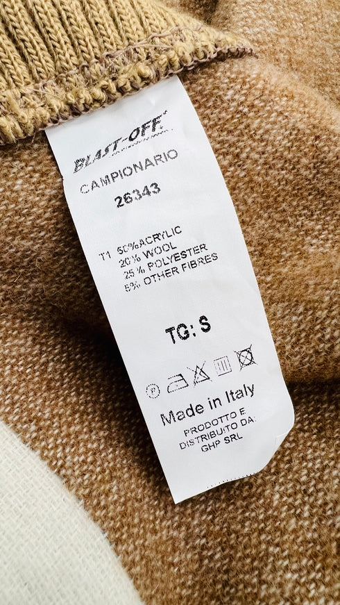 Poncho oversized con frange