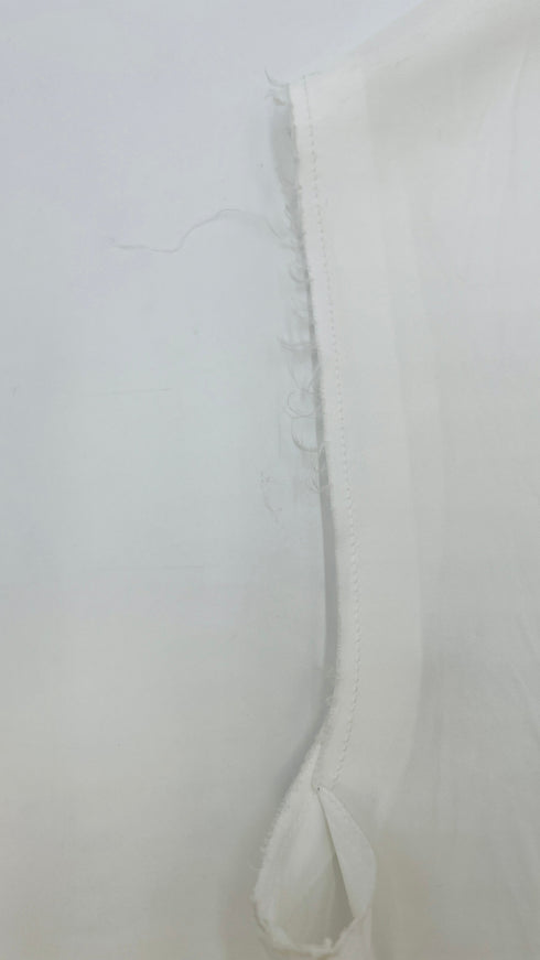 Top scollo V con cartellino