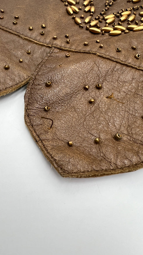 Gilet in pelle con perline