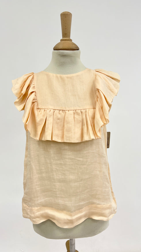 Top smanicato con volant