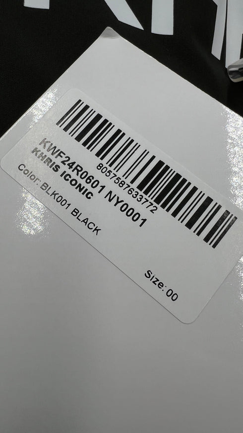 Piumino "Iconic" con cartellino