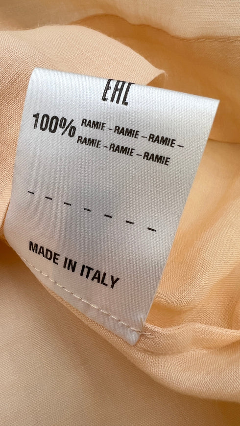 Top smanicato con volant