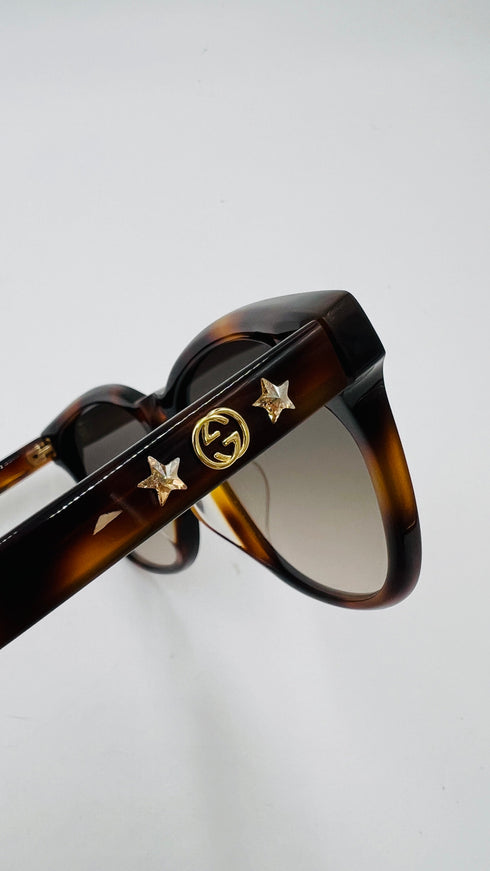 Occhiali da sole logo e stelle