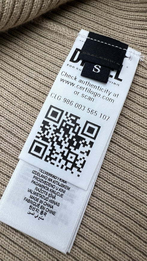 Abito corto a costine con cartellino