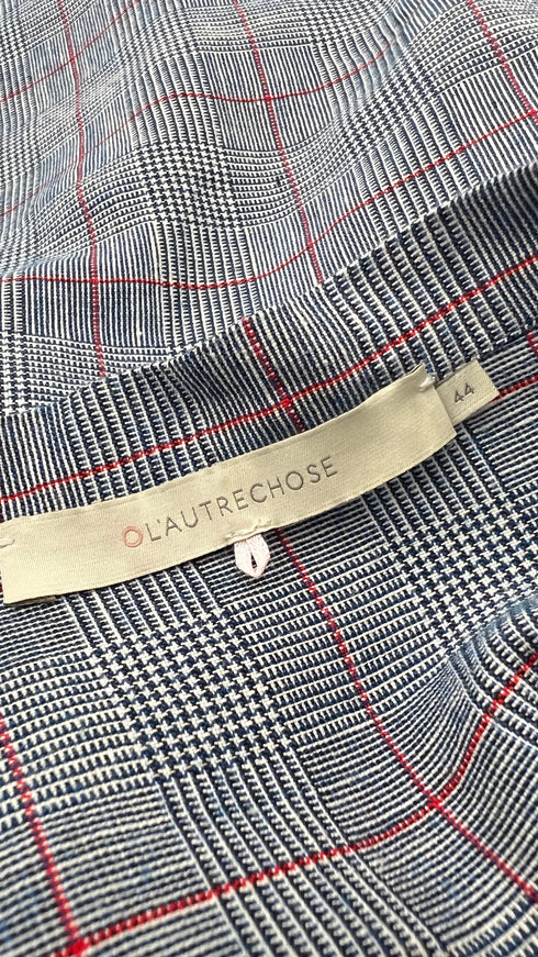 Top smanicato con volant