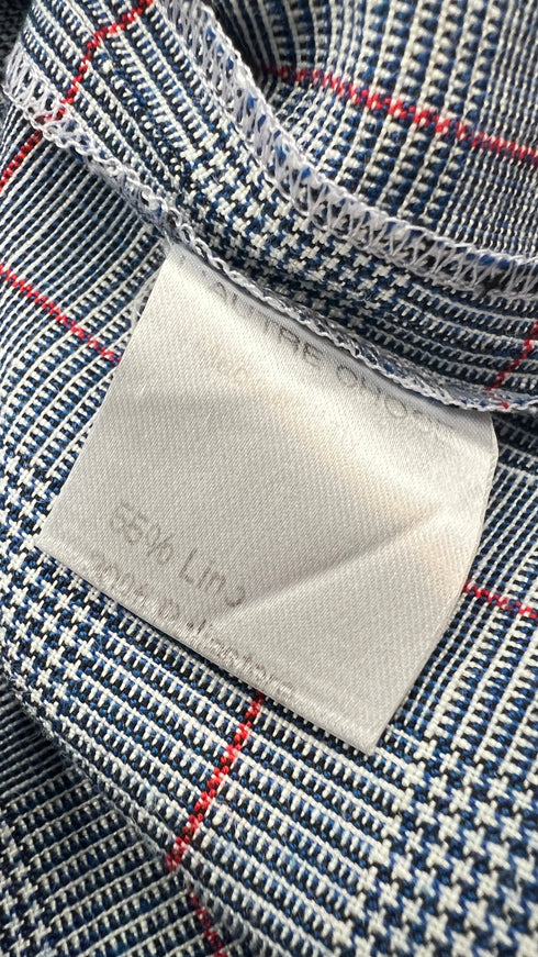 Top smanicato con volant