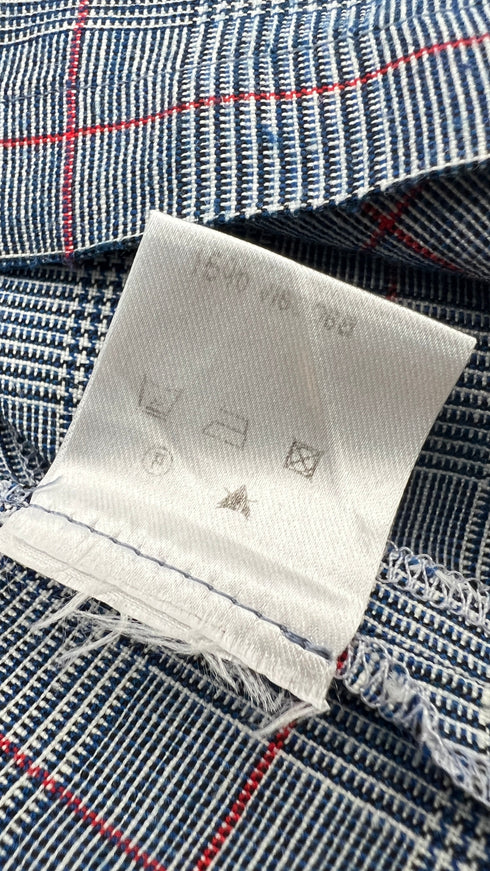 Top smanicato con volant