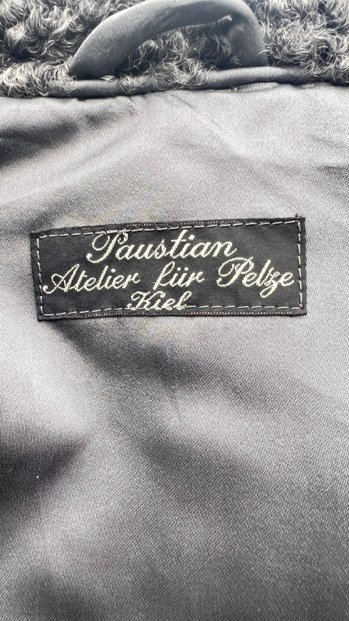 Pelliccia bouclé lunga