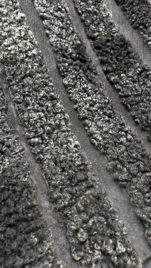 Pelliccia bouclé lunga