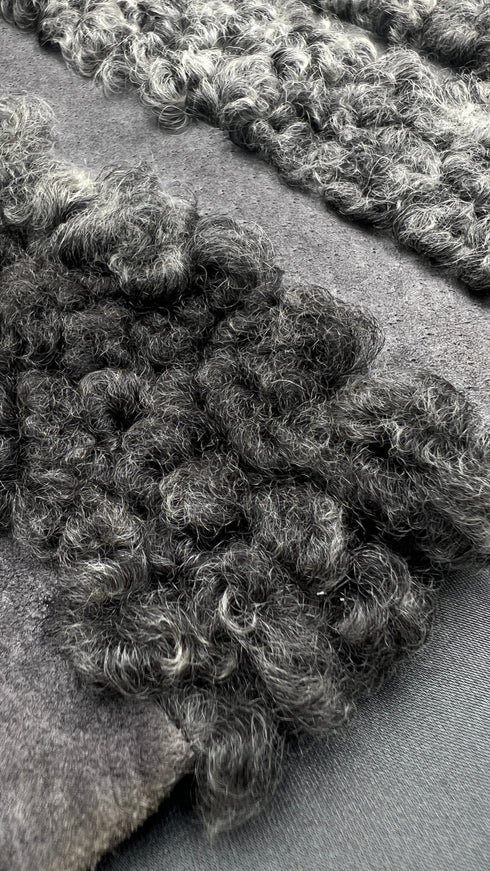 Pelliccia bouclé lunga