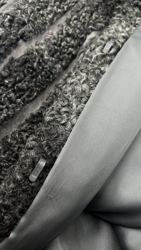 Pelliccia bouclé lunga