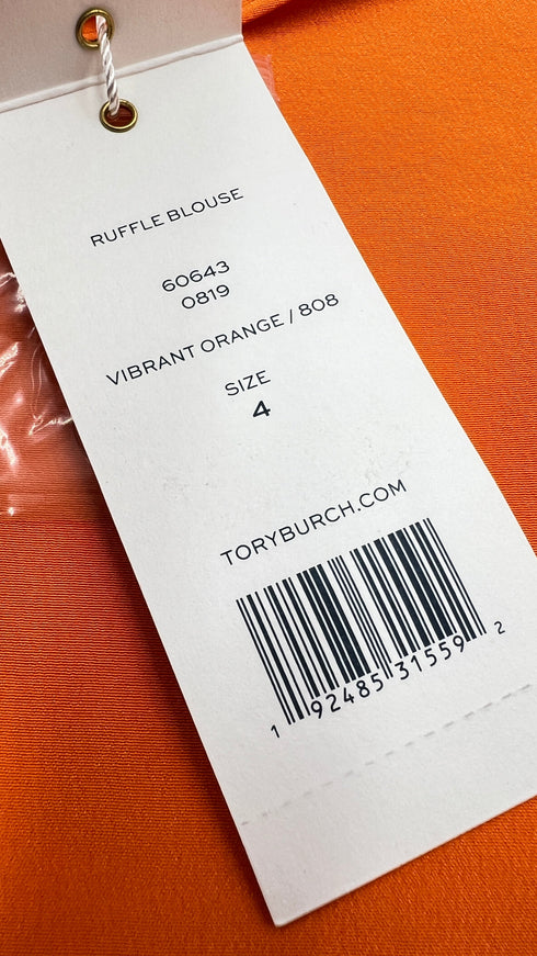 Blusa in seta con cartellino