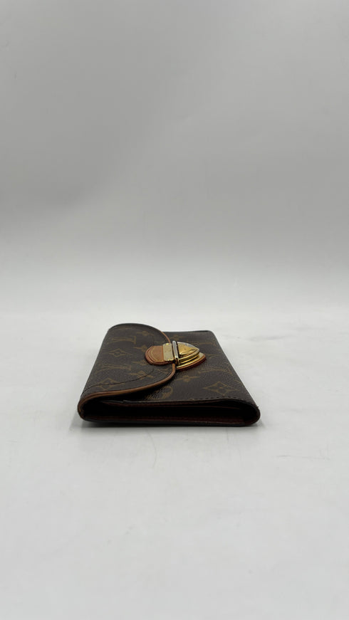 Portafoglio con chiusura oro