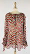 Blusa stampa a cuori astratti