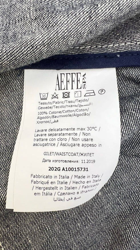 Gilet denim con cartellino