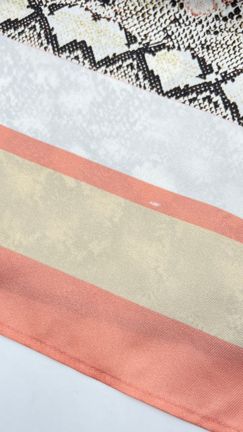 Top in seta con cartellino