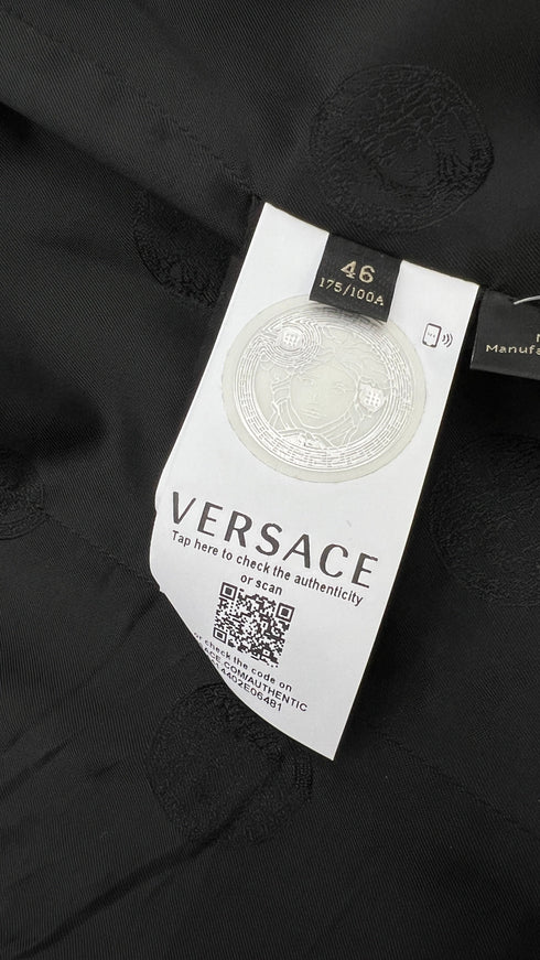 Blazer in pelle con spilla