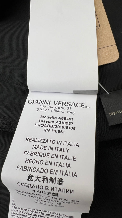 Blazer in pelle con spilla