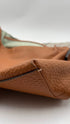 Borsa in pelle martellata