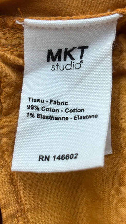 Pantaloni slim cut con cartellino