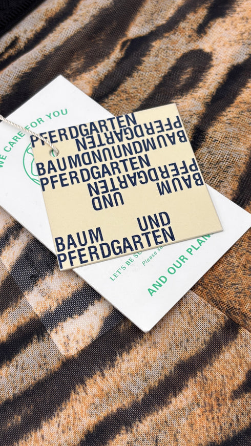 Leggings sheer animalier con cartellino