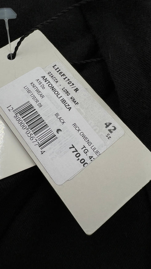Cardigan asimmetrico nero con cartellino