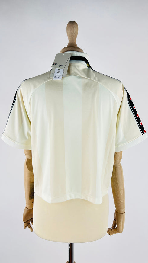 Polo a righe con cartellino