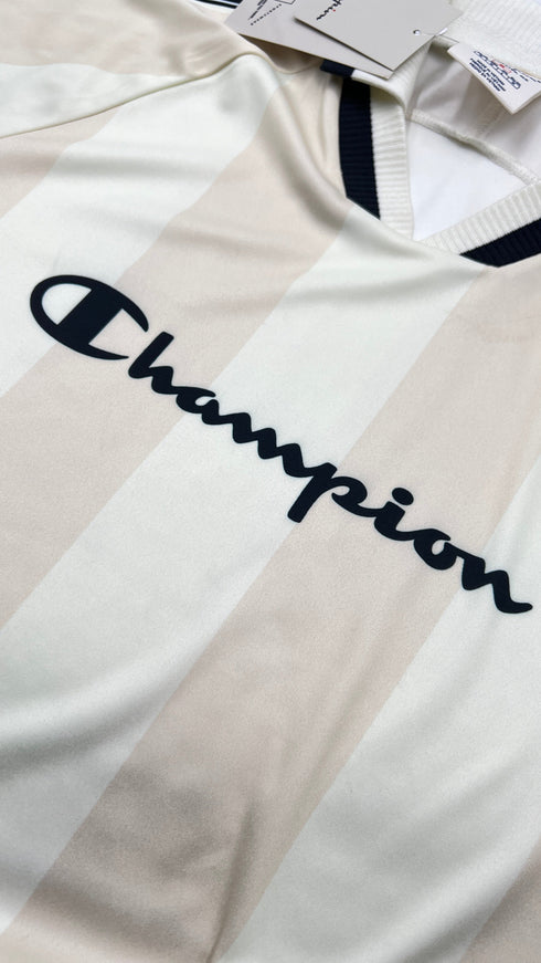 Polo a righe con cartellino