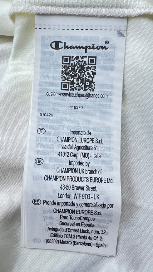 Polo a righe con cartellino