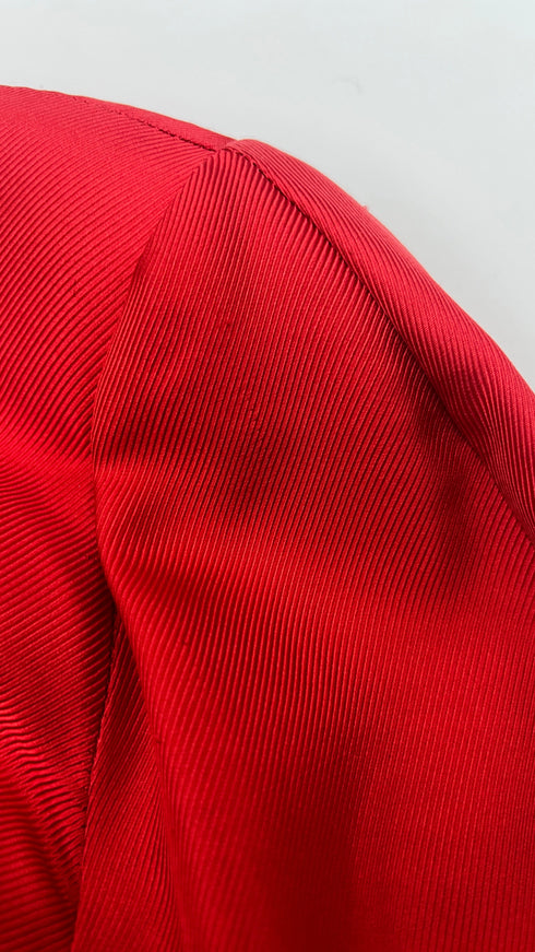 Blusa rossa con fiocco