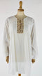 Blusa vintage con ricamo