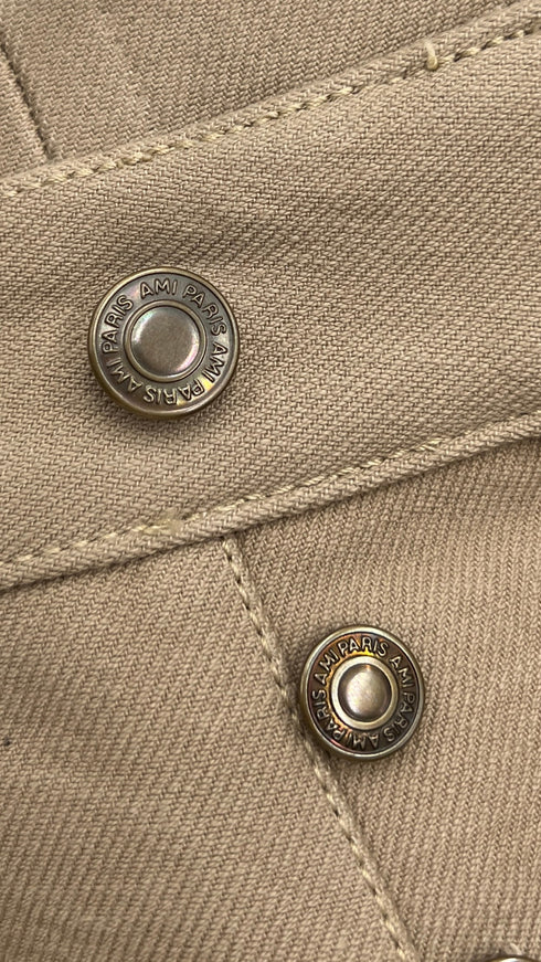 Pantaloni beige a gamba larga