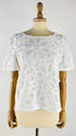 T-shirt con pizzo bianco