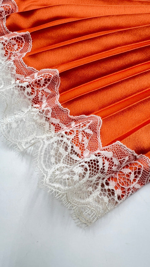 Top plissé con pizzo