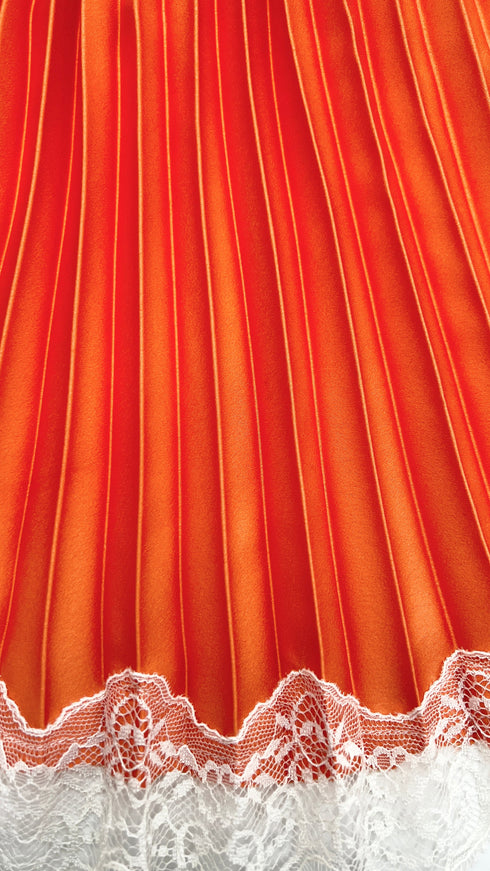 Top plissé con pizzo