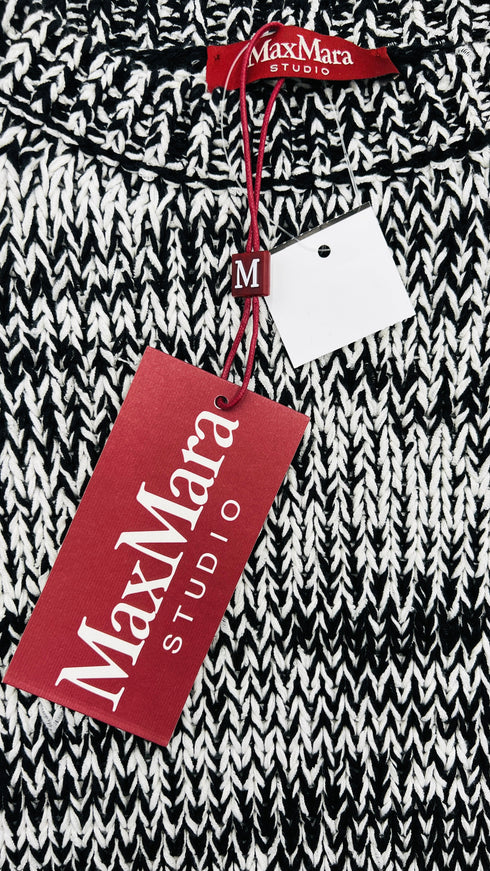 Maglione mélange con cartellino