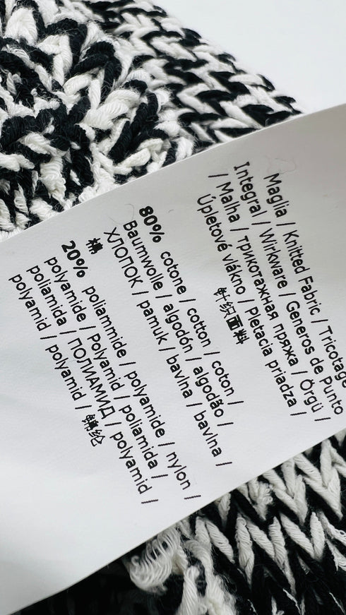 Maglione mélange con cartellino