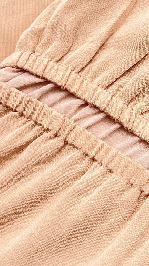 Abito corto con drappeggi